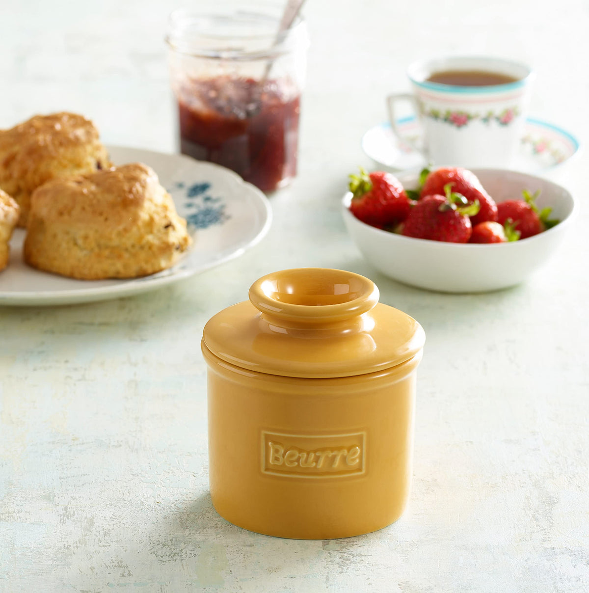 Butter Bell inverted lid design demonstrates simple, spill-free serving.