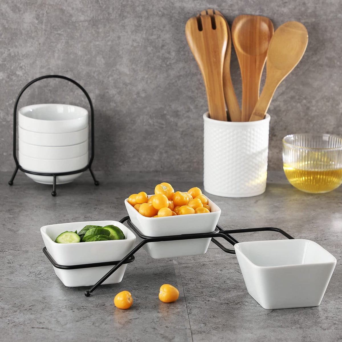 Entertaining set by Buyajuju showcases porcelain bowls with a modern rack.