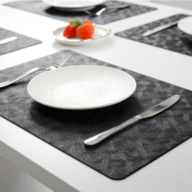 BxzanDya placemats faux-leather finish looks premium and durable.