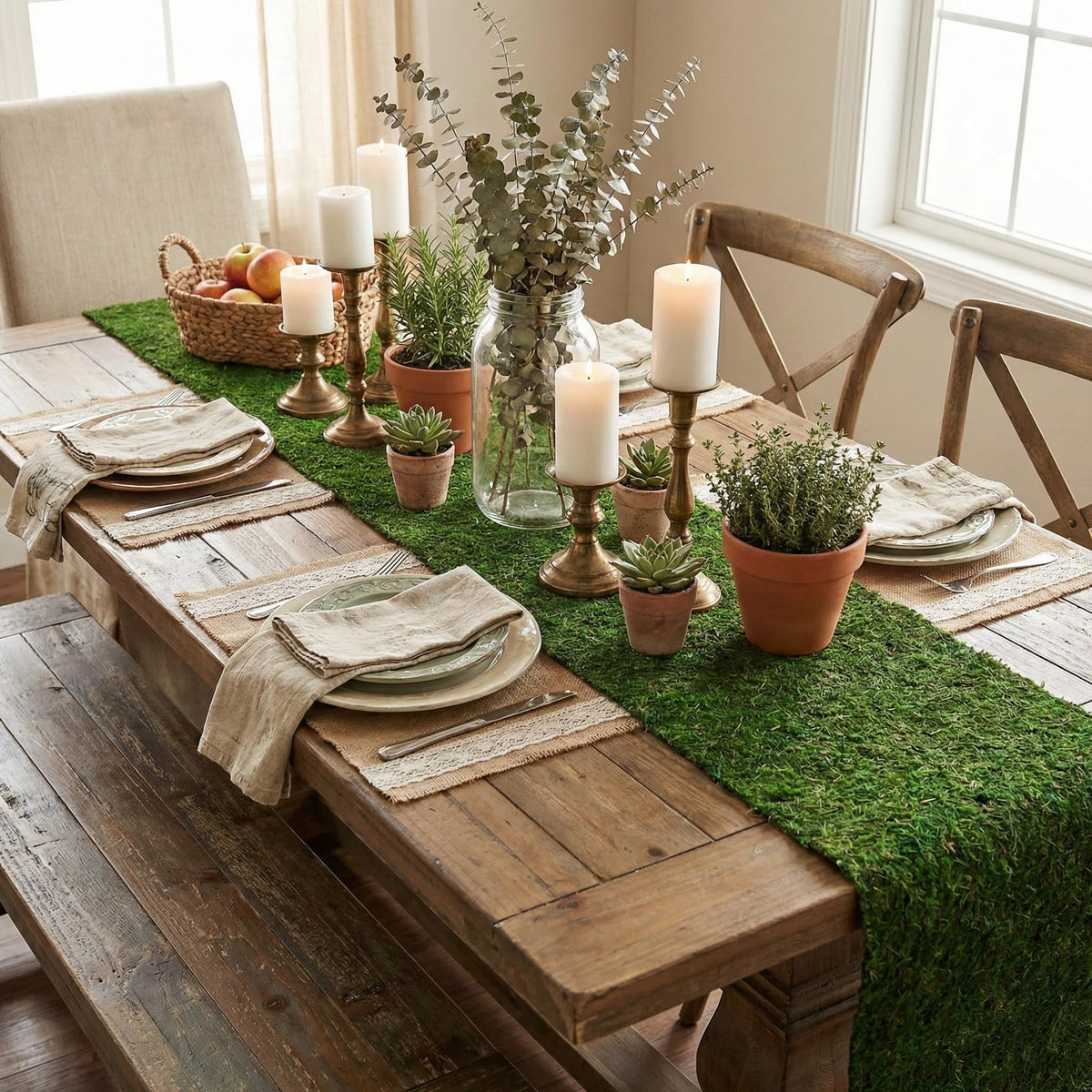 BYHER table setting with moss runner showcases natural evergreen ambiance