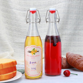 Cadamada labels, funnels, and pourers simplify bottling and labeling tasks.