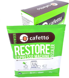 Powder dissolving in water with Cafetto Restore descaler to start the cleaning cycle.