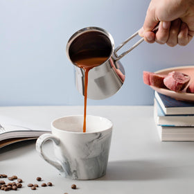 Caizen Coffee briki decorative design adds charm to any kitchen.