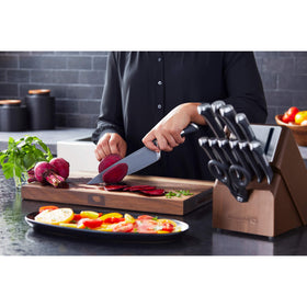 Compact knife block design saves counter space while keeping blades accessible.