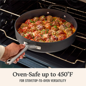 Calphalon pan withstands stovetop use and oven heat up to 450°F.