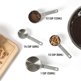 Calphalon Prime 1/3 cup detail showcasing metric and standard markings.