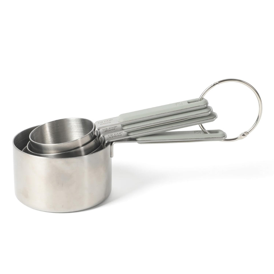 Calphalon Prime measuring cups with taupe handles for precise wet and dry measurements.