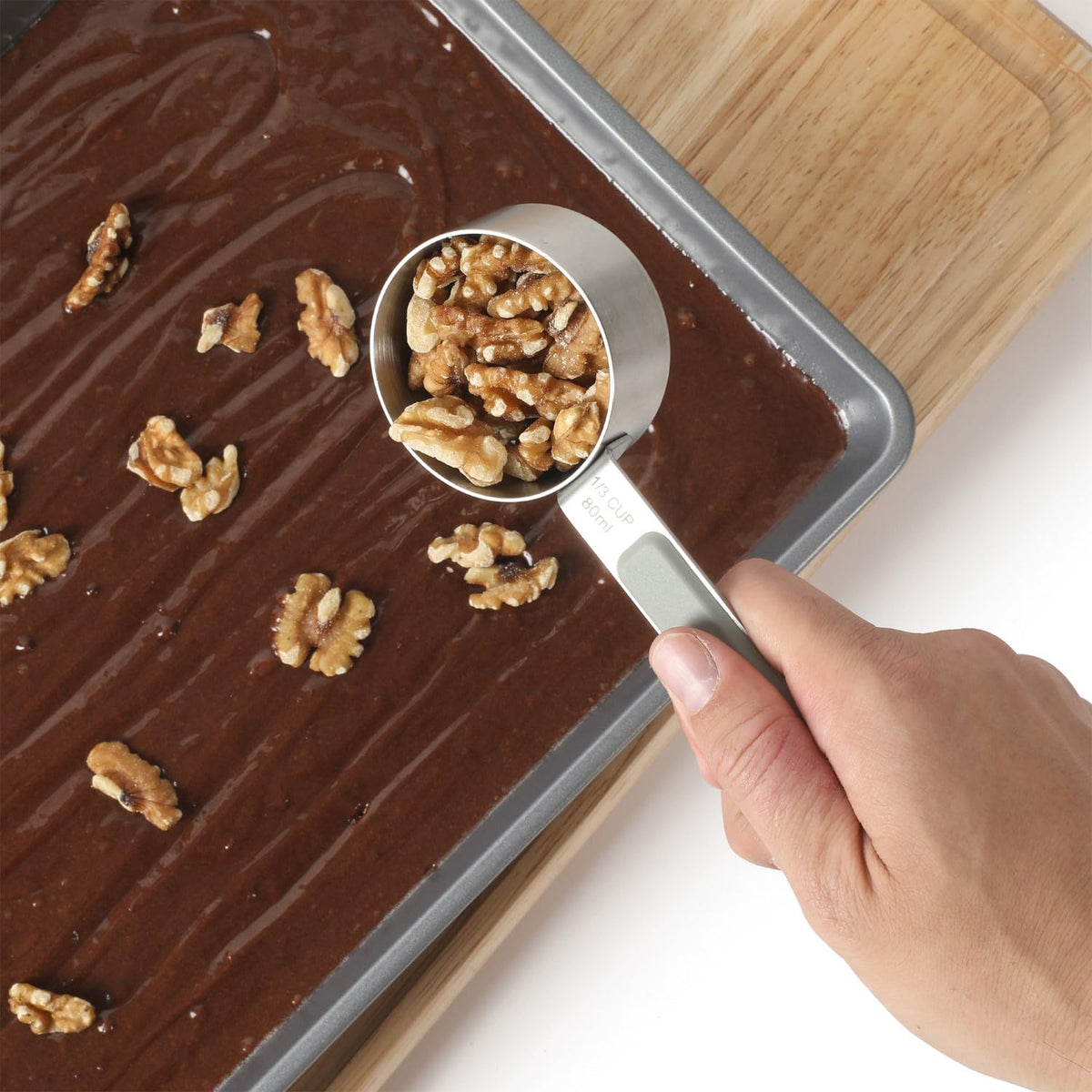 Calphalon Prime nesting-capable cups for space-saving kitchen organization.