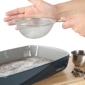 Calphalon Prime strainer with sturdy handle offers a secure grip