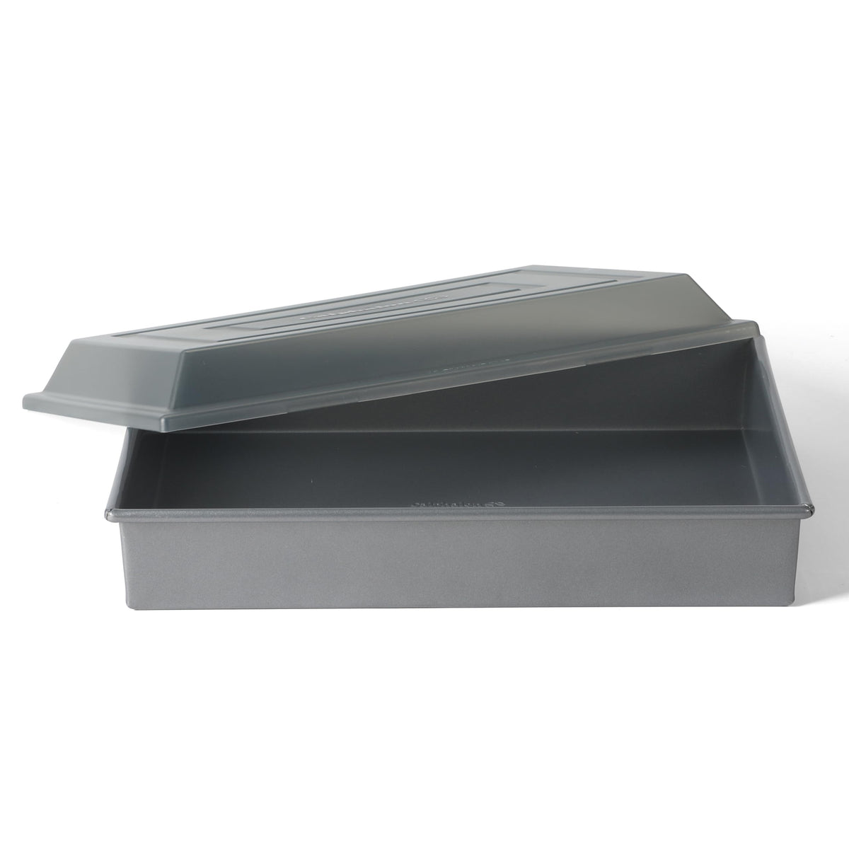 Calphalon Titan cake pan with lid for even baking and simple release.