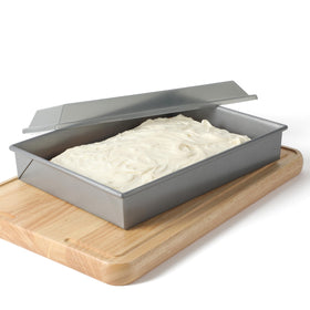 Calphalon Titan cake pan close-up showing nonstick interior release.