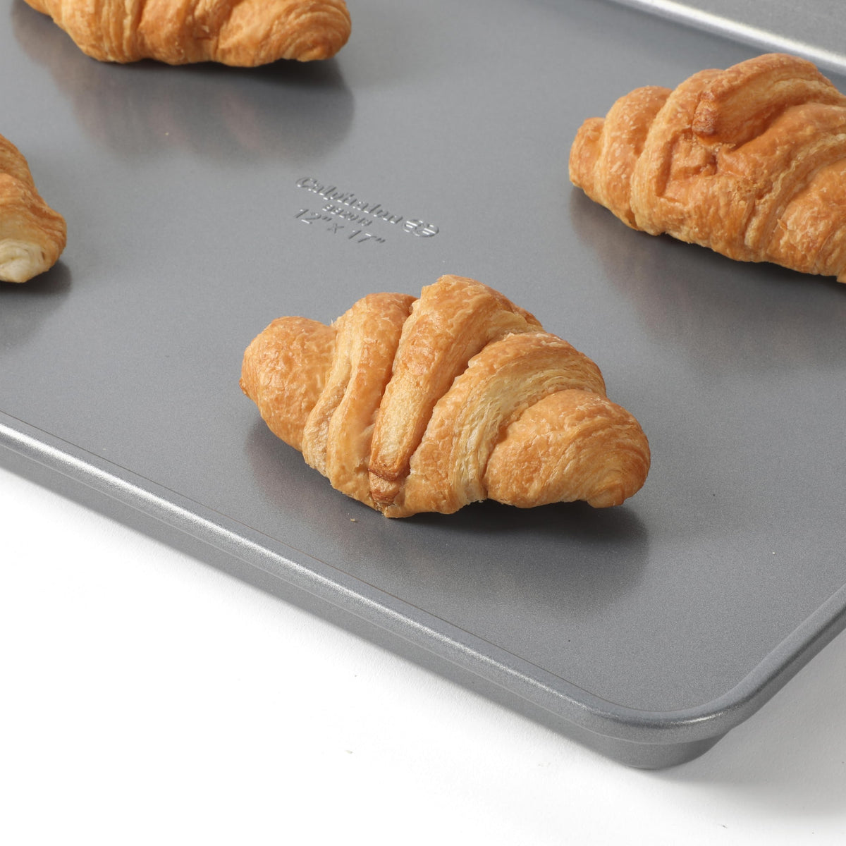 Calphalon Titan reinforced rolled edges resist warping during high-heat baking