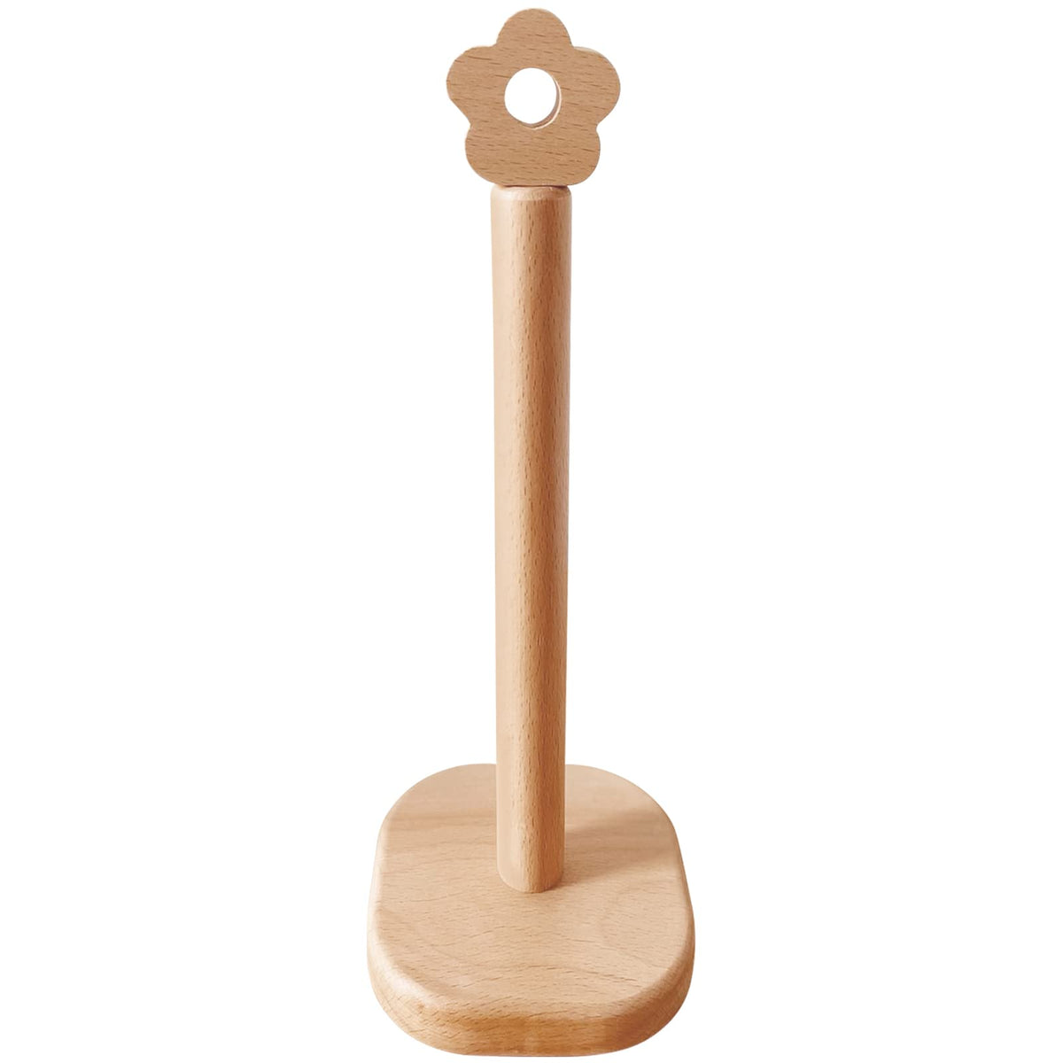 Cambiar paper towel holder with flower design on a counter, adds natural warmth and accessibility.