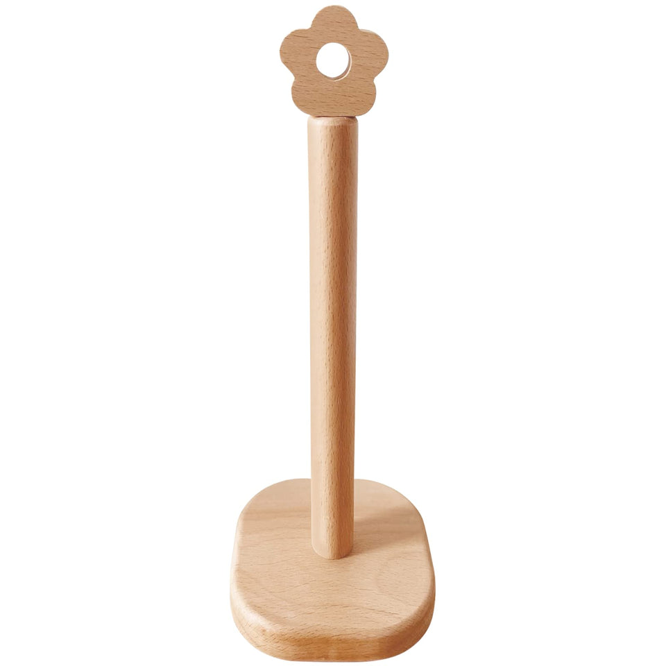 Cambiar paper towel holder with flower design on a counter, adds natural warmth and accessibility.