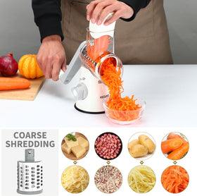 Cambom cheese grater with suction base in action on a counter.
