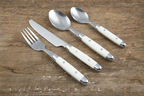 Cambridge Jubilee 18/0 stainless steel with durable beige plastic handles.