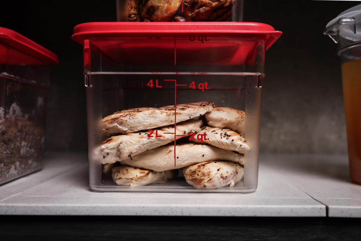 Cambro two-pack food storage with red lids keeps ingredients organized.