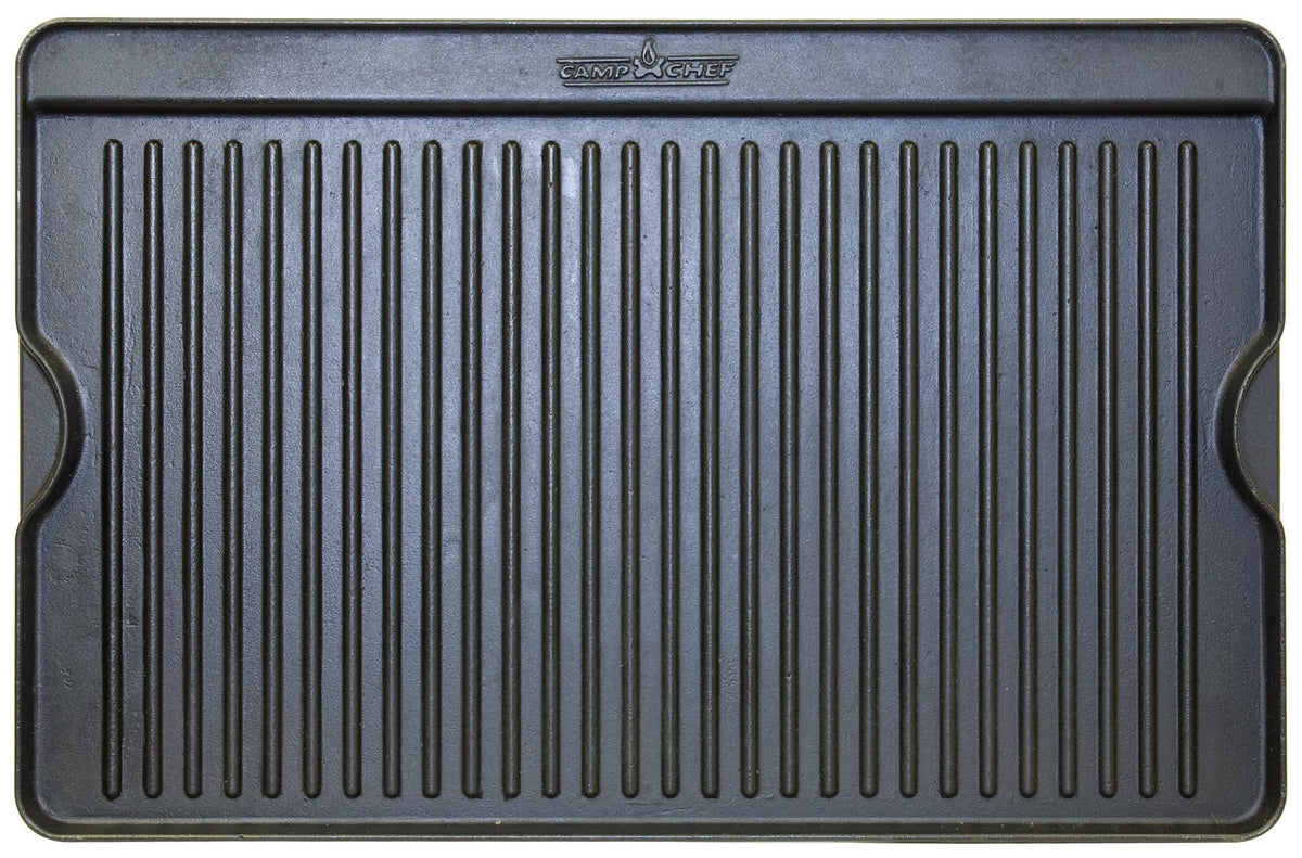 Camp Chef cast iron griddle 16x24, reversible surface for versatile cooking and even searing.