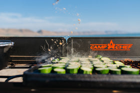 Camp Chef cast iron griddle 16x24, ribbed side creates sear marks on burgers and more.