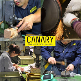In-use CANARY scissors cutting meat and poultry with a secure, slip-free grip.