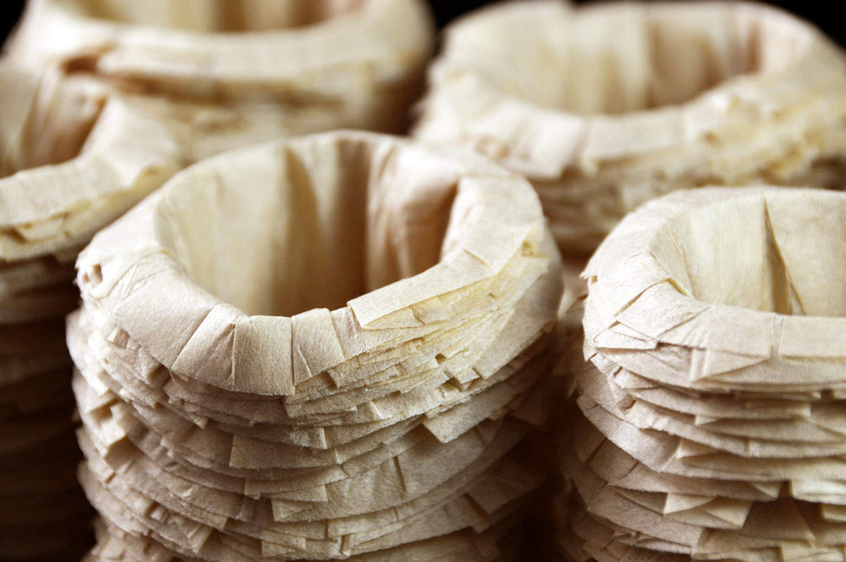 CanFly disposable K-Cup filters showcased for sediment-free coffee.