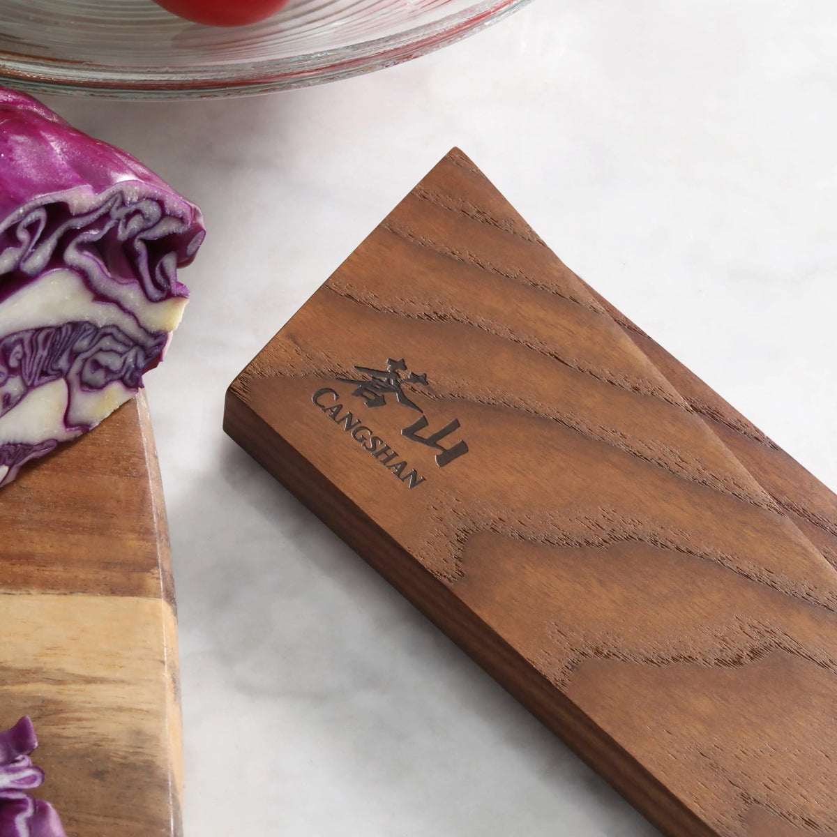 Copper-toned magnet detail on Cangshan knife sheath