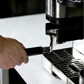 CAPFEI training tool aids espresso practice and technique development at home.