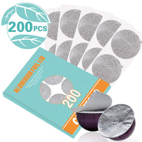 Close-up of CAPMESSO reusable lid being cut with scissors for filling