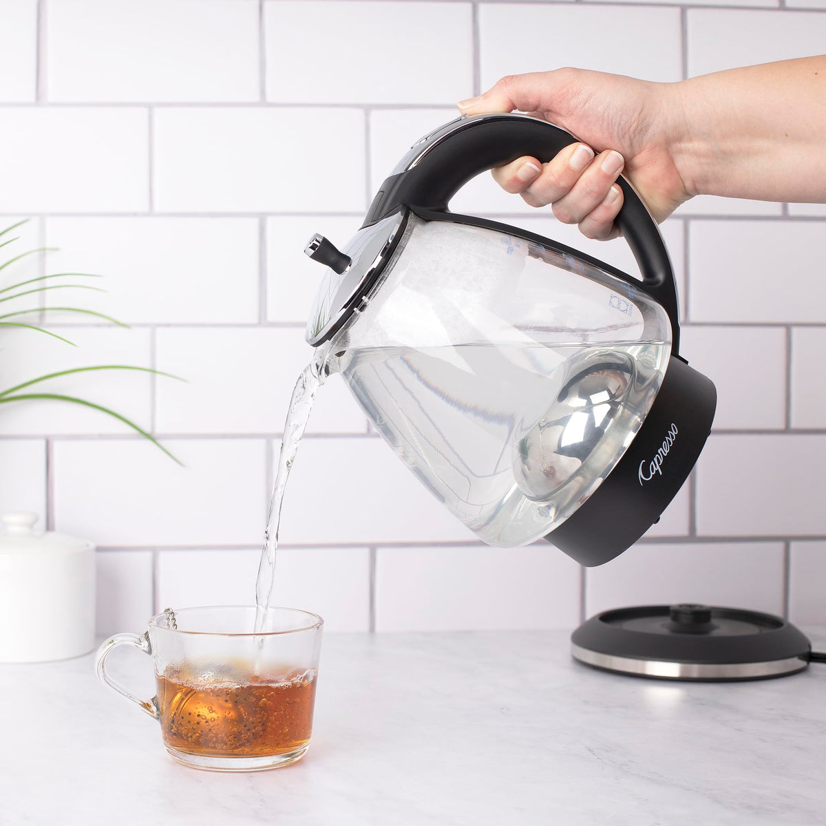 Capresso H2O glass kettle auto-off feature for safety after boiling.