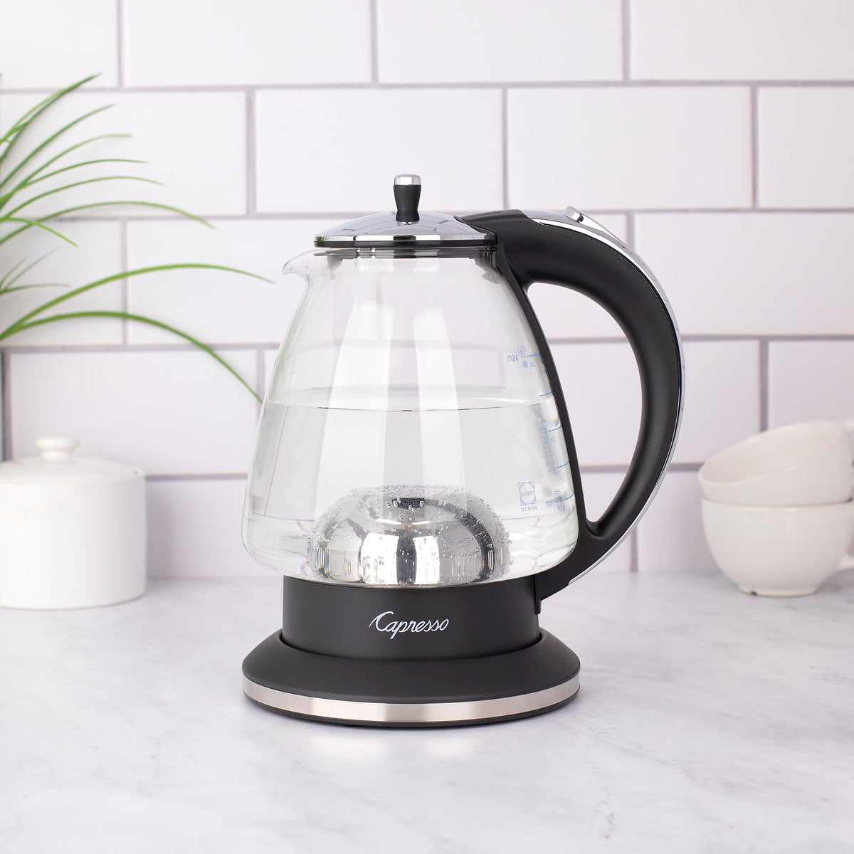 Capresso H2O kettle with ounce and cup markings for precise filling and measuring.