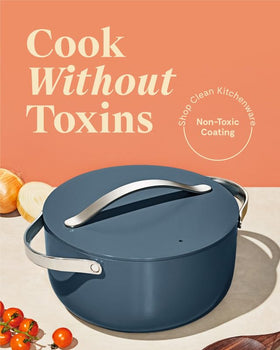 Caraway navy interior Dutch Oven with nonstick surface for low-oil searing.