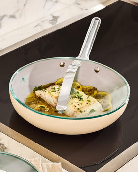 Caraway glass lid offers clear view while preserving heat during simmering