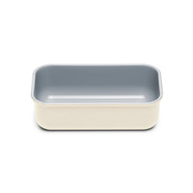 Caraway loaf pan cream side view showing slick non-stick surface for easy release.