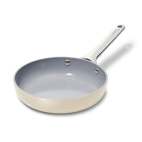 Caraway 8-inch mini fry pan with cream finish, ideal for single servings and easy cleanup.