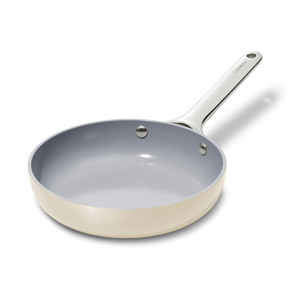 Caraway 8-inch mini fry pan with cream finish, ideal for single servings and easy cleanup.