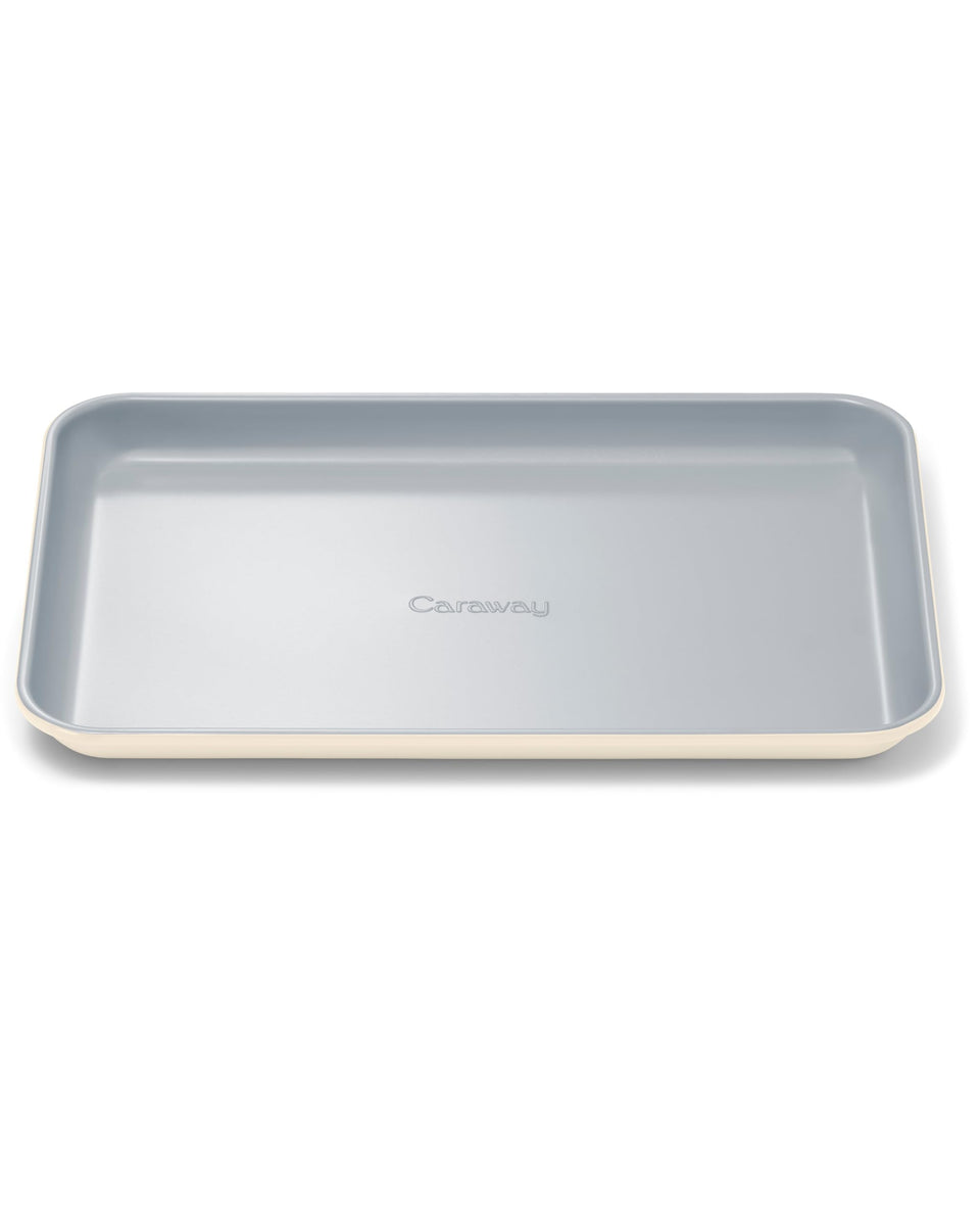 Caraway small baking sheet with ceramic coating for easy release.