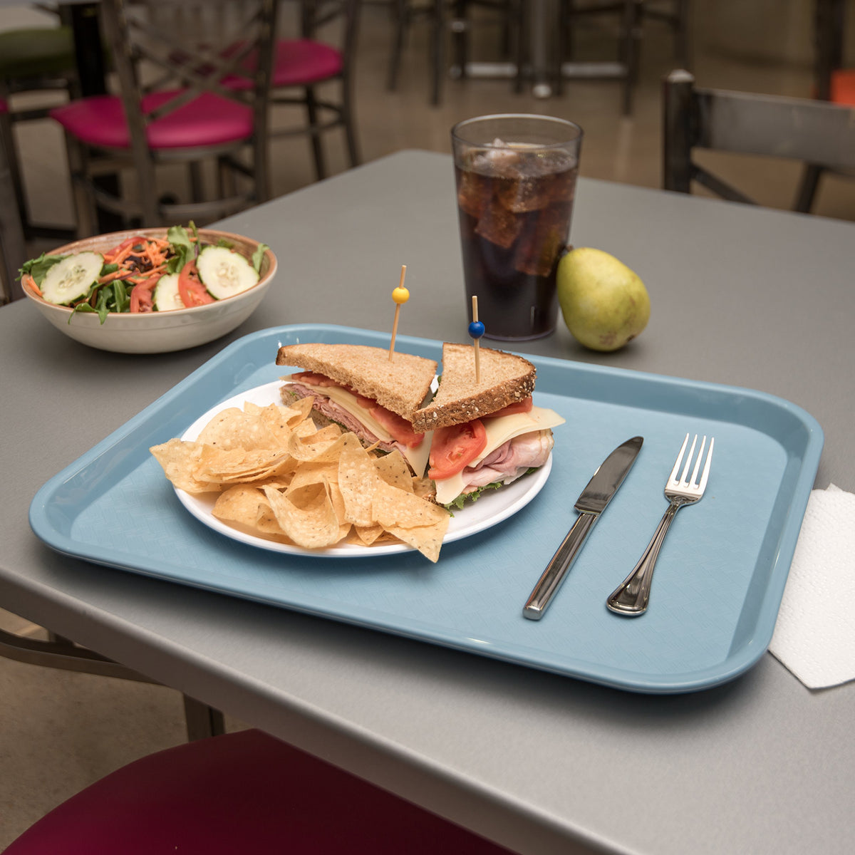 Carlisle CFS scratch-resistant top keeps trays looking clean in high-traffic environments.
