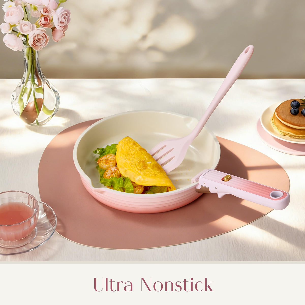 Detachable handles enable oven use and table service in pink set.