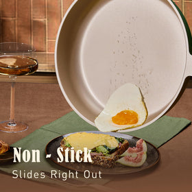 CAROTE 2-quart saucepan with lid for precise simmering and pour-friendly design.