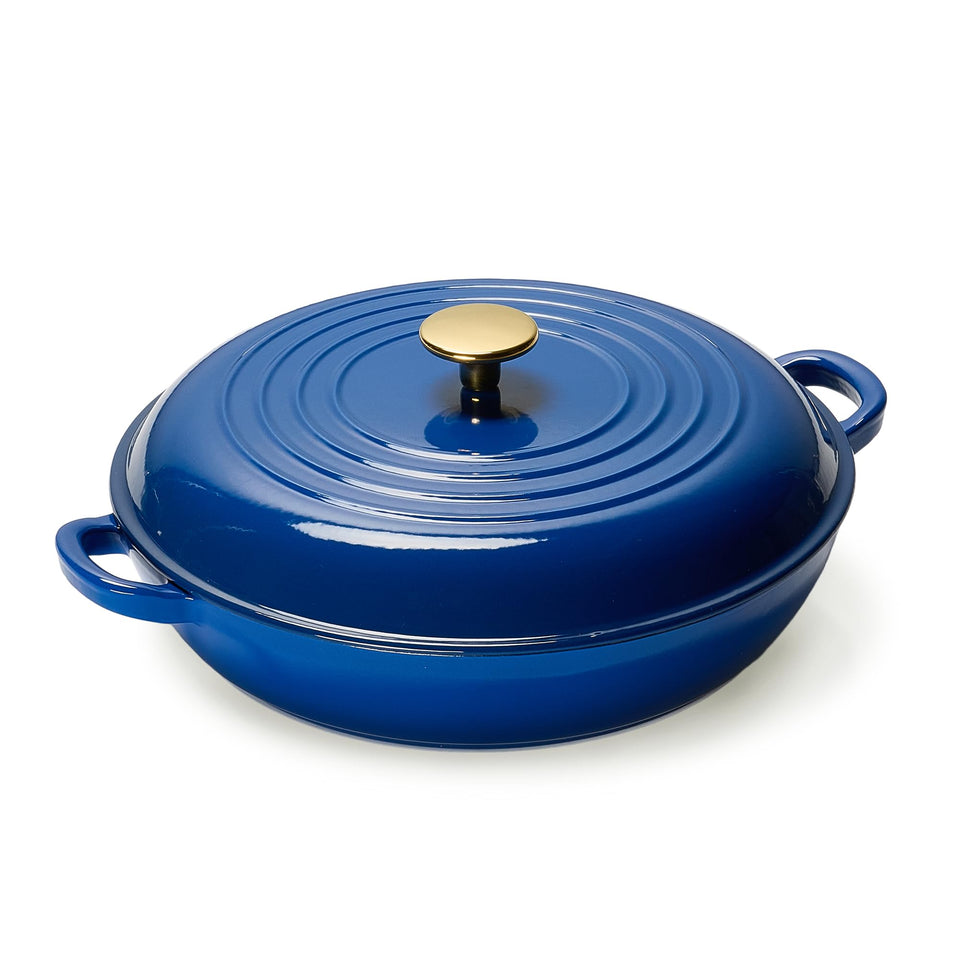 CAROTE 3.4qt braiser with blue lid for even cooking and moisture retention.