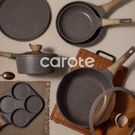 CAROTE pan protectors included for organized storage and surface protection.