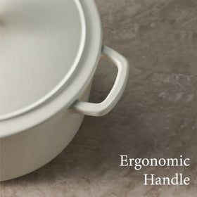 Carote enameled cast iron with cool-touch dual handles.