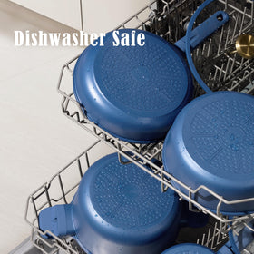 CAROTE cookware set ready for kitchen organization with included pan protectors.