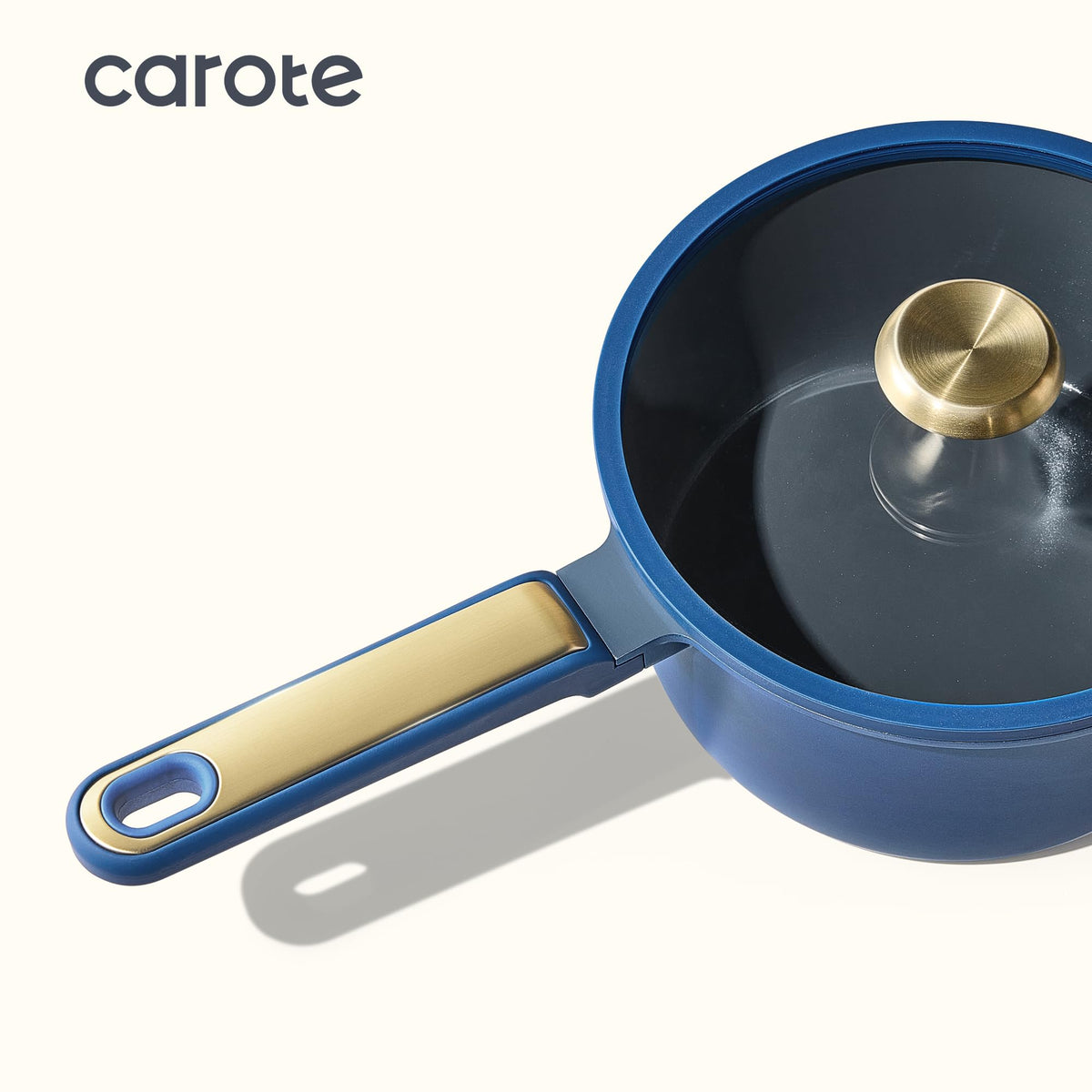 CAROTE stockpot with lid demonstrates large-batch cooking capability for soups and stews.