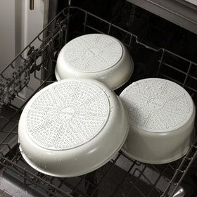 CAROTE compact storage design demonstrates space-saving cookware.