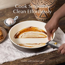 CAROTE sturdy lids help trap heat for flavorful results.