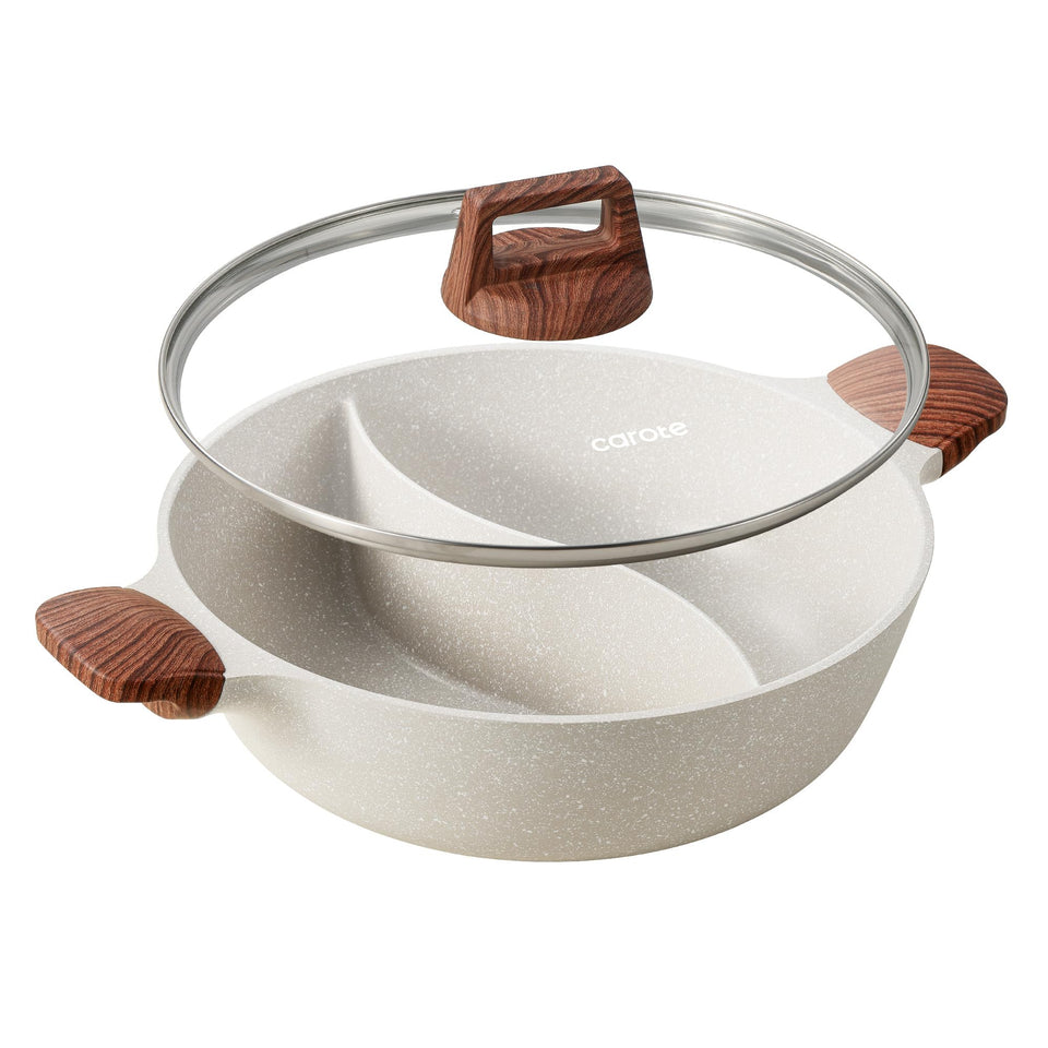 CAROTE hot pot with divider and glass lid for dual-flavor meals on any stove.