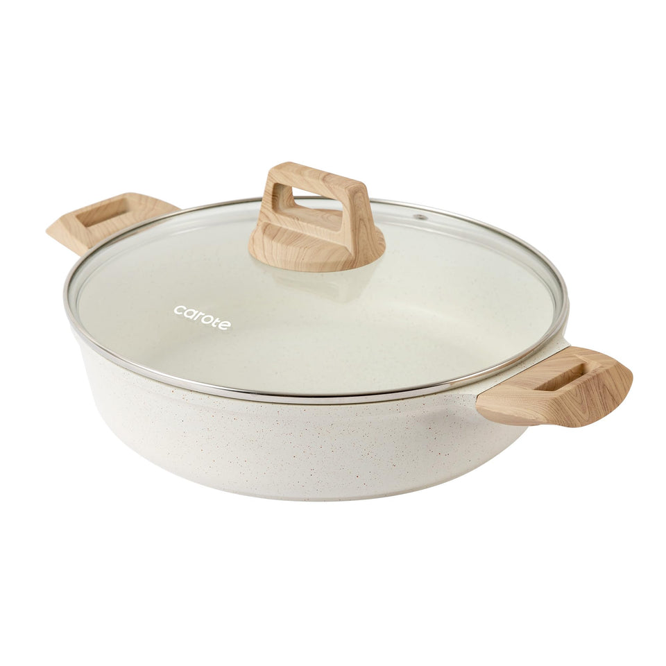 CAROTE nonstick stock pot with lid for quick cleanup and even heating.