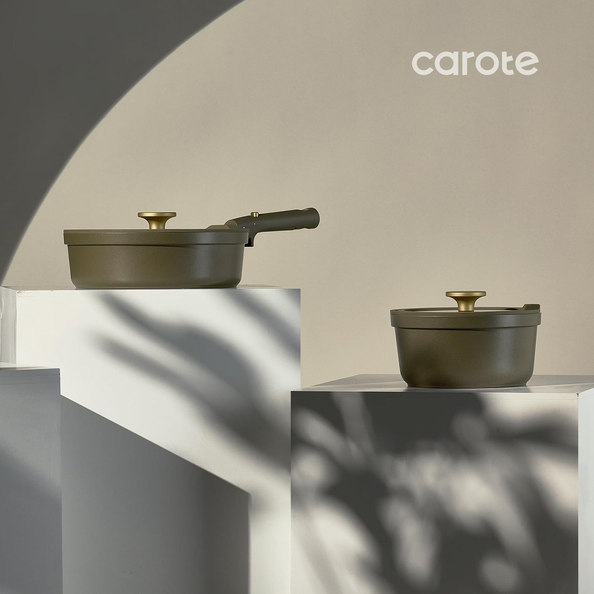 Carote olive-green glass lids with silicone rims help monitor simmering without mess.