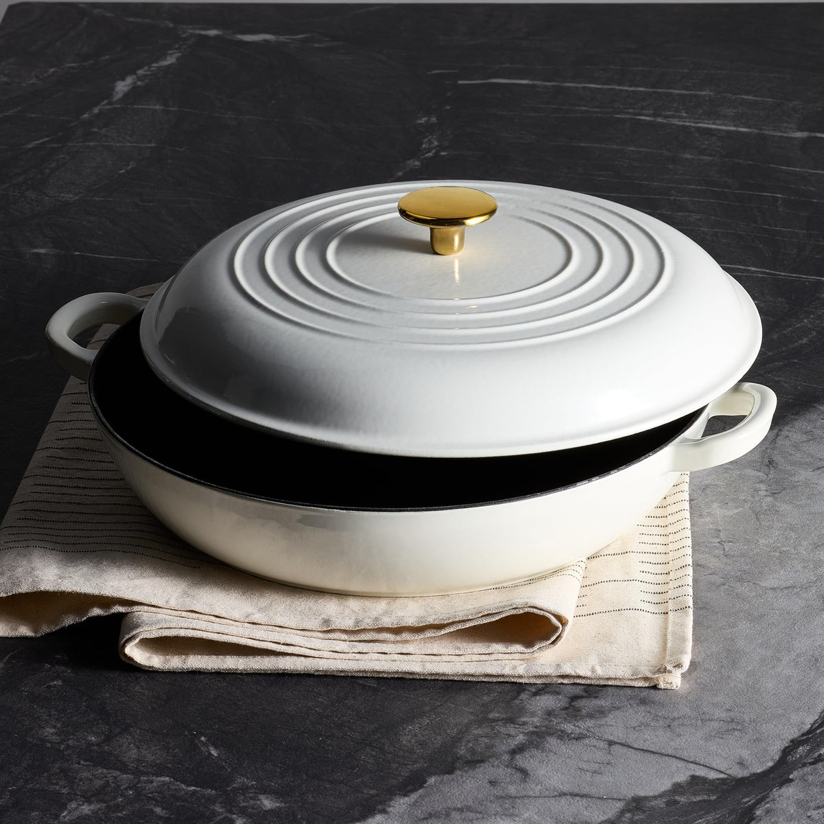 CAROTE oven-safe braiser pan up to 502°F for finishing dishes.